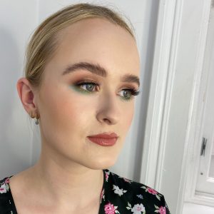 soft glam look for fair skin with green lower lash line