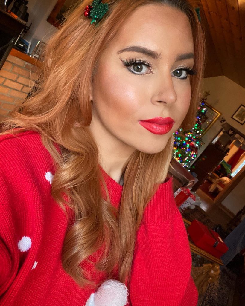 jenny workman with red lip makeup look