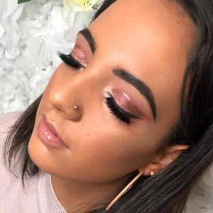 pink makeup with glitter liner